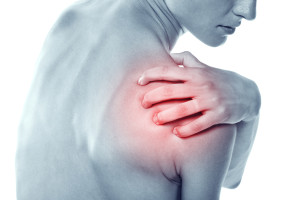 Acute pain in a shoulder at the young women.